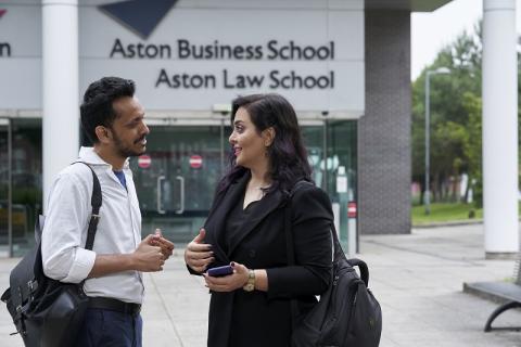 Aston students outside the Business School and Law School building
